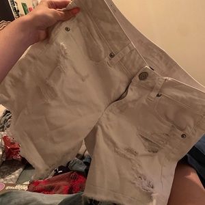 White shorts with rips